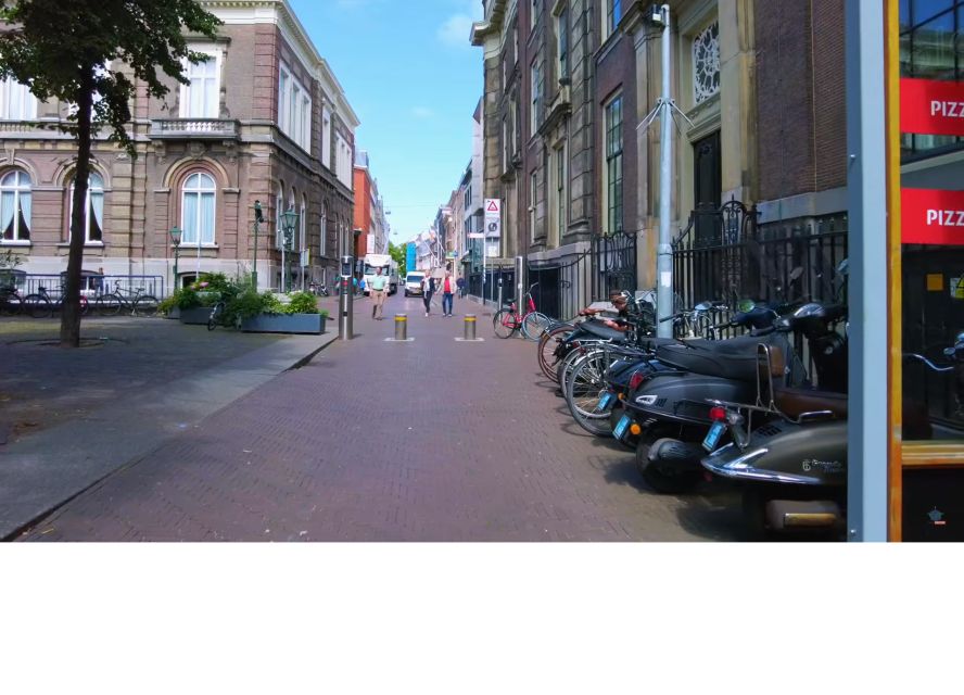 Delft and The Hague: Private Half-Day Tour with Transfer - First walking block in Delft, leaning tower and Vermeer streets