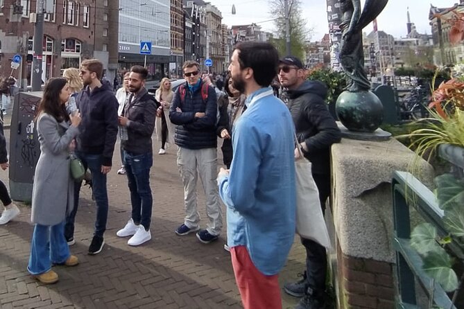 Discover the City Centre of Amsterdam - Red Light District context, then the House on the Three Canals and WWII hidden printing press