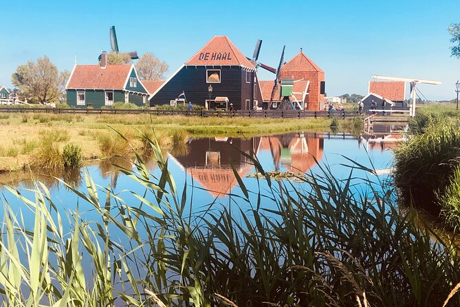 Dreamy Dutch Villages Tour: Giethoorn, Zaanse Schans & More - Zaanse Schans: Windmills, Green Houses, and Dutch Water-Management Stories