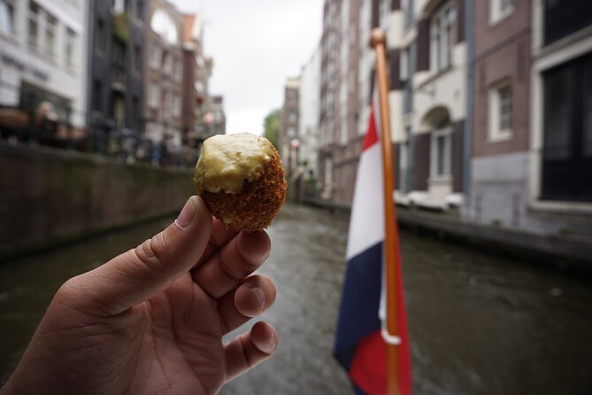 Eating Amsterdam: Food Tour & Canals Cruise - Mama’s Koelkast: Surinamese rotirol for a wider Dutch food map
