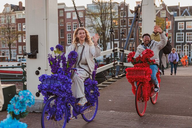 Explore Amsterdam canals on iconic Flower Bikes - Museum Quarter stops, including the Rijksmuseum area