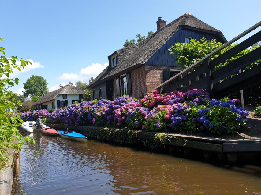 From Amsterdam: Giethoorn Day Trip with Small Electric Boat - Giethoorn by canal, no roads, and a small electric boat