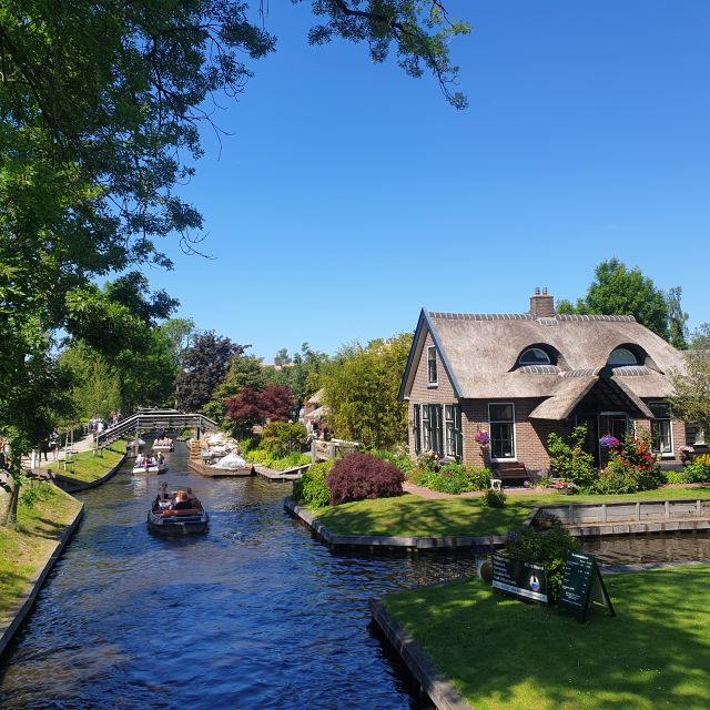 From Amsterdam: Giethoorn Day Trip with Small Electric Boat - The village walk: 180+ bridges, thatched cottages, and photo angles