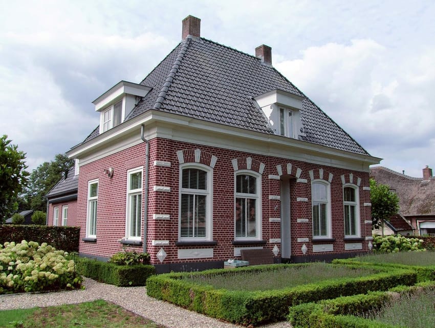 From Amsterdam: Zaanse Schans and Giethoorn Countryside Trip - Giethoorn: car-free canals, thatched cottages, and your boat tour time