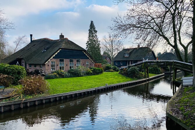 Giethoorn and Zaanse Schans Day Tour Small Group Incl. Boat Ride - Zaanse Schans Windmills and Cheese Factory: Where the Netherlands Tastes Like Gouda