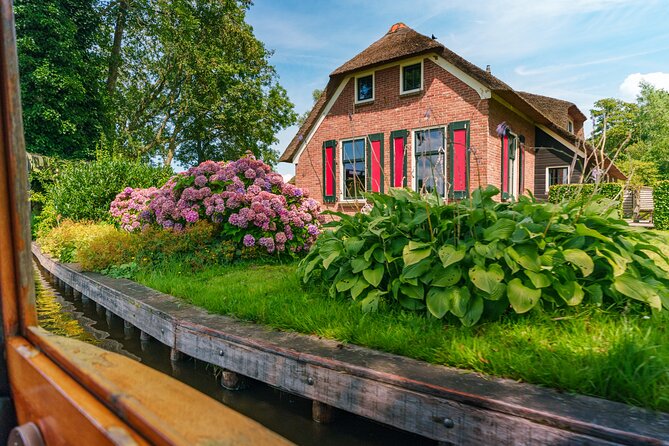 Giethoorn Day Trip from Amsterdam with Boat Trip - The Dyke Stop Question: Why Afsluitdijk Time Can Change Your Day