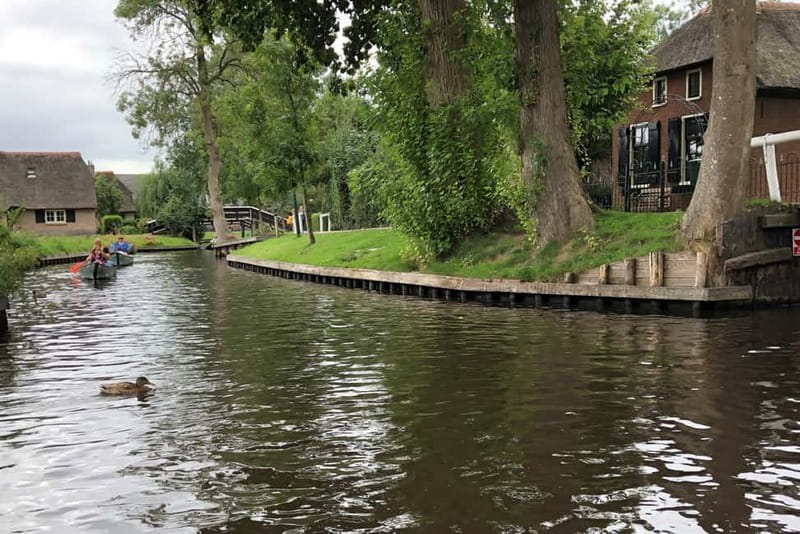 Giethoorn: Luxury Private Closed Boat Tour with captain - The captain and narration: local context, with one small uncertainty