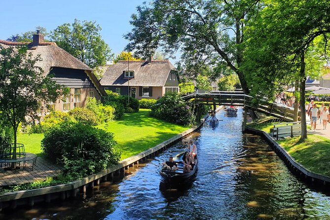Giethoorn, Zaandam & Zaanse Schans Day Tour w/ Small Boat Ride - Zaanse Schans: Windmills, Green Houses, and a Panoramic River Photo