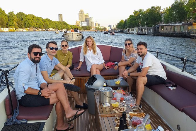 Guided Amsterdam Canal Cruise – Snacks & Drinks on board(1 Hour) - Why this 1-hour Amsterdam canal cruise feels like good value