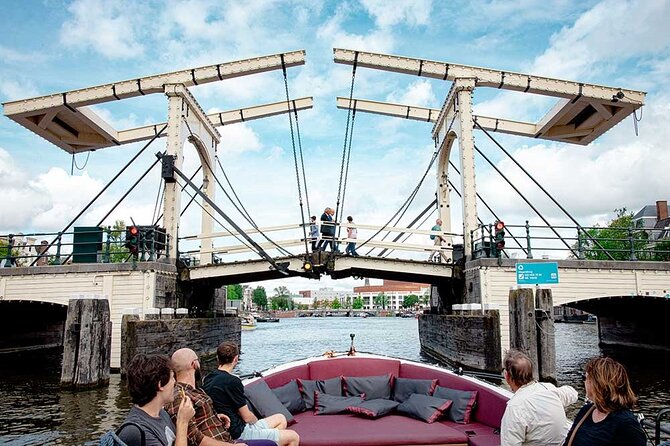 Guided Amsterdam Canal Cruise – Snacks & Drinks on board(1 Hour) - Drinks and Dutch cheese on board, and how to pace the hour