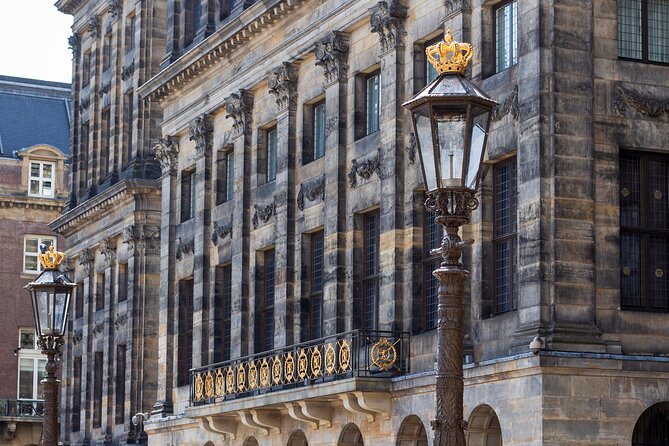 Guided Walking Tour Amsterdam - Legends, History & Ghost Stories - Stop 5: Near Central Station, a historic hotel, and Rembrandt’s drawing on the gallows fields