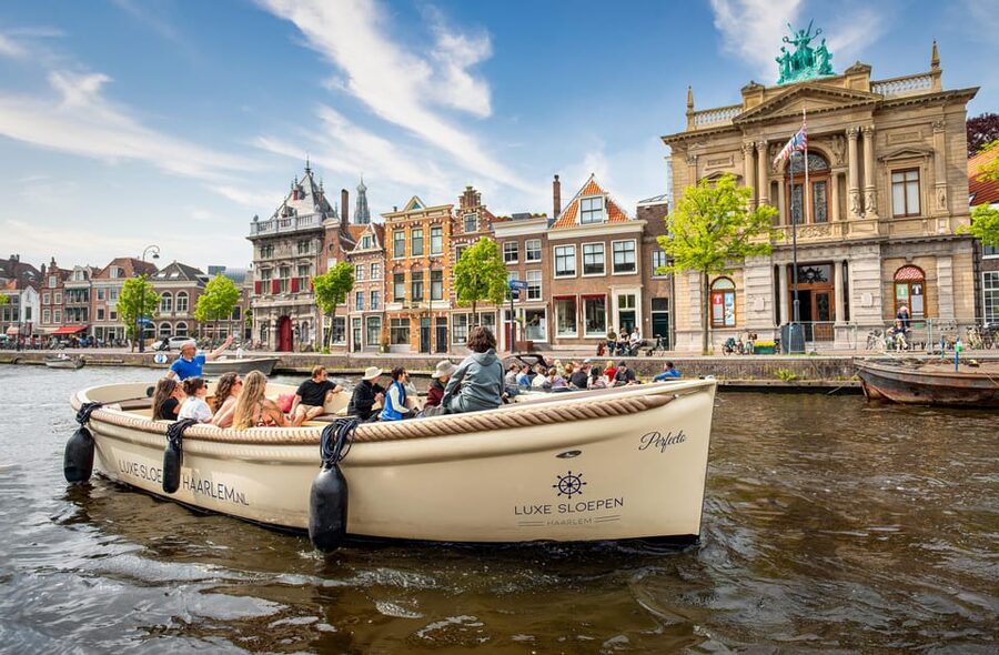 Haarlem: Guided Highlights Canal Cruise on Open Boat - From Waag to Nieuwe Gracht, you see Haarlem as a connected system