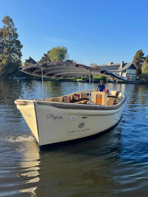 Haarlem: Guided Highlights Canal Cruise on Open Boat - The guide team and the English and Dutch flow on board