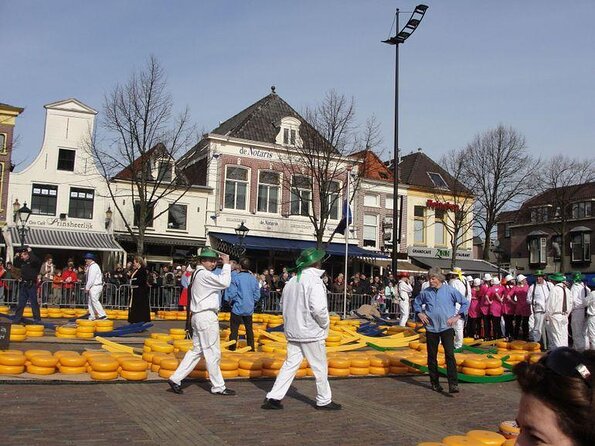 Half-Day Edam and Volendam Private Walking Tour from Amsterdam - Edam Old Hofjes: Courtyards, Charity History, and Modern Social Housing