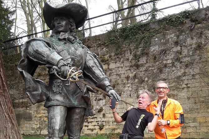 Highlight Running Tour - Market Square and the torch statue of Minckeleers