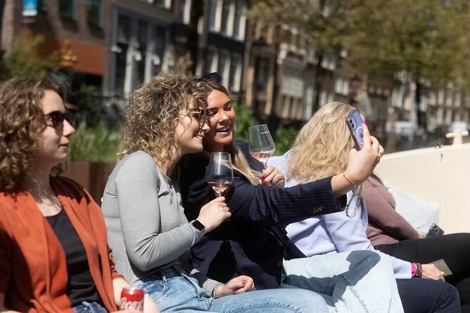 Highlights and Local Insights Canal Cruise Tour in Amsterdam - Your boat experience: quiet, cozy, and built for photos