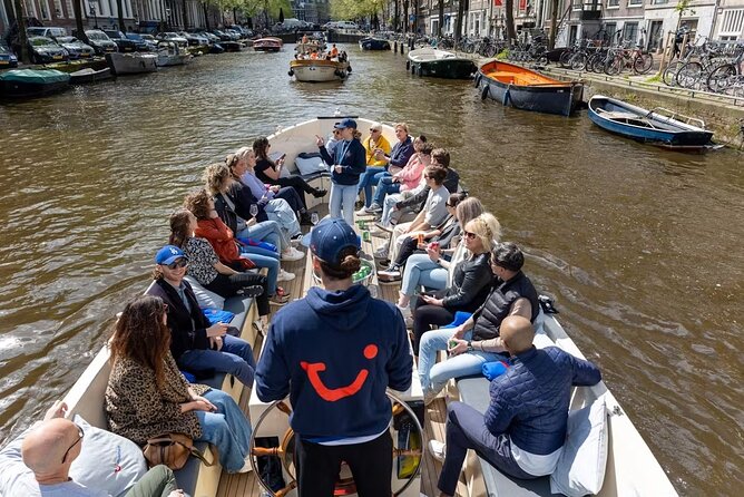 Highlights and Local Insights Canal Cruise Tour in Amsterdam - The neon Red Light District, Oude Kerk, and Mini Venice