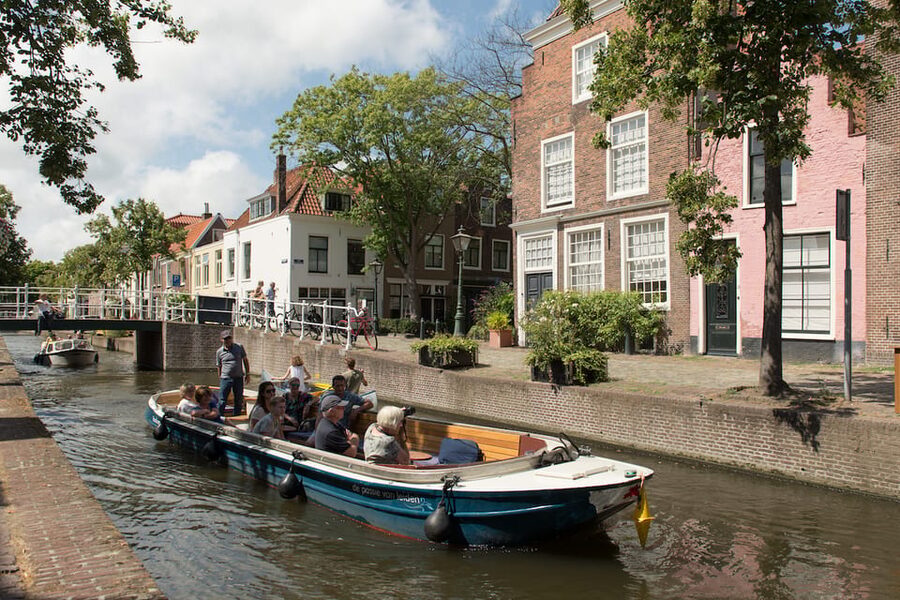 Leiden: Guided City Canal Cruise - The boat experience: calm, scenic, and often on an electric setup