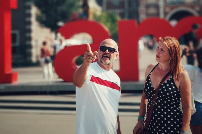 LGBTQI+ History Tour of Amsterdam - Canal walk toward Dam Square, plus 17th-century city planning