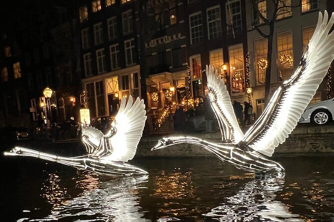 Light‌ ‌Festival‌ ‌Private‌ ‌Cruise‌ incl Snacks and hot Gluhwein - Amsterdam Light Festival at water level, not street level