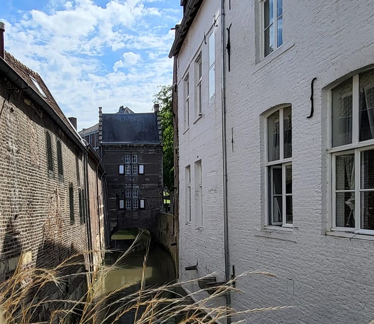 Maastricht Hidden Gems Tour Uncover the Unexpected - Helpoort, Jekerkwartier, and the city wall by the Jeker River