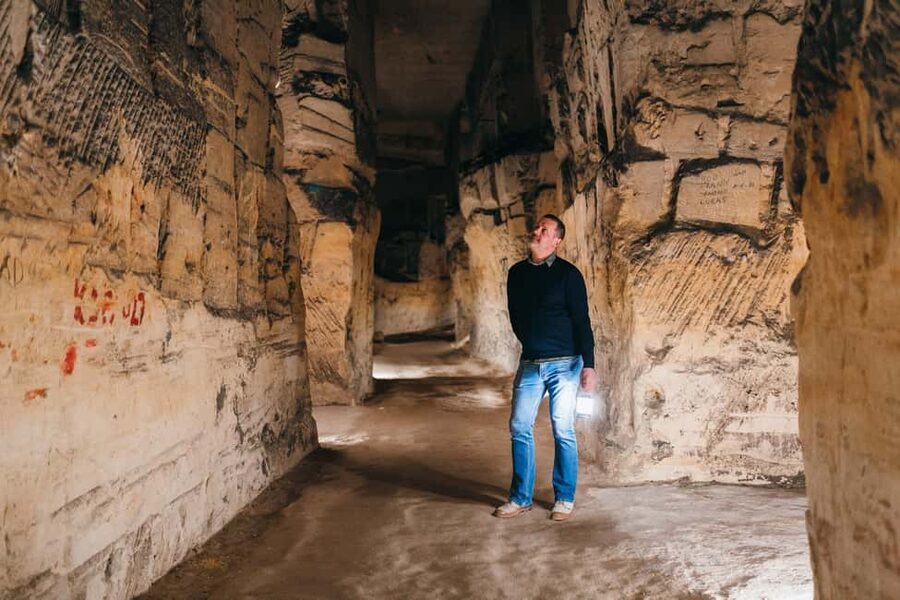 Maastricht: North Caves Guided Tour - Block breakers, charcoal drawings, and inscriptions on the walls