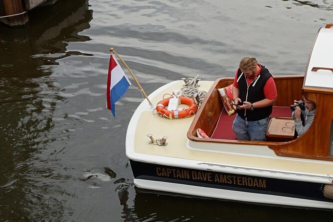 Morning Canal Cruise Amsterdam in Small-Group - Dry comfort: heating, blankets, and warm drinks that make winter feel doable