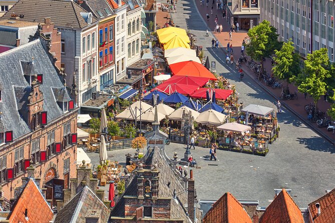 Nijmegen: City Walk with Audio Guide in 7 Languages on your Phone - Latin School and the Moenen story: why the audio keeps you interested