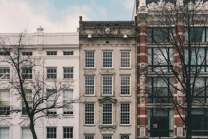 Personalized Hidden Gems of Amsterdam Private Tour with a Local - St. Nicolas Basilica, Dancing Houses, and the City’s Architectural Weirdness