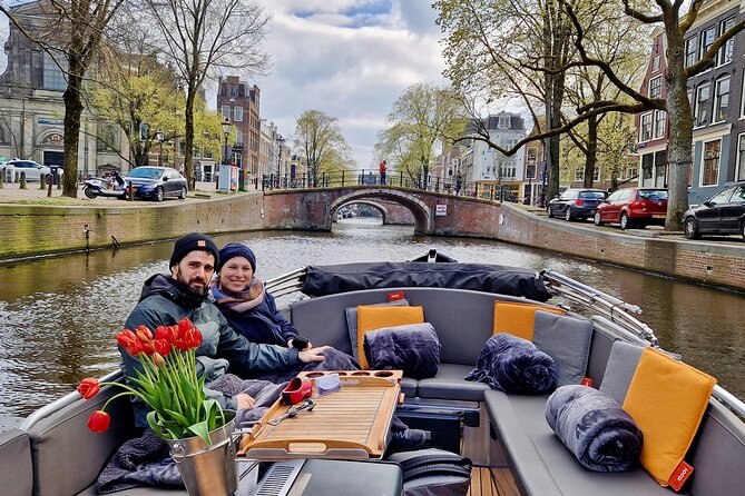 Private 90 Minute Amsterdam Canal Belt Exploration Cruise - Jordaan canals: Noorderkerk, Westerkerk, and the Seven Bridges view