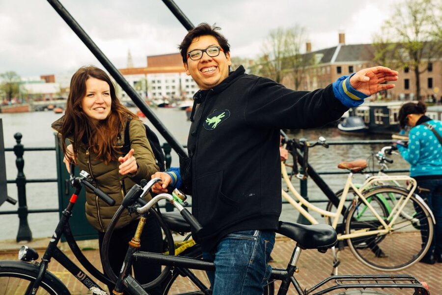Private Amsterdam Bike Tour with a Local - West-Indisch Huis, a hidden courtyard, and small moments that feel personal