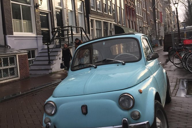 Private Amsterdam Bike Tour with a local guide (also for families) - Dam Square and Damstraat: where the city began
