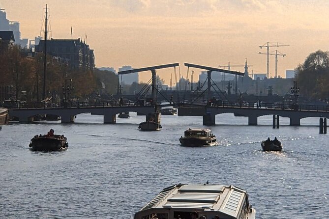 Private Amsterdam Historical Walking Tour - De Beurspassage to the UNESCO canal ring: details that explain Amsterdam