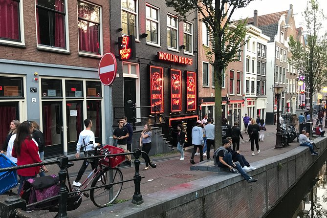 Private Amsterdam Red Light District and Coffee Shop Tour - The Smallest House and the Condomerie: Odd Stops With Purpose