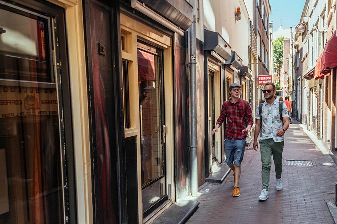 Private City Kickstart Tour: Amsterdam - Bloemenmarkt atmosphere and the “what year is it?” feeling