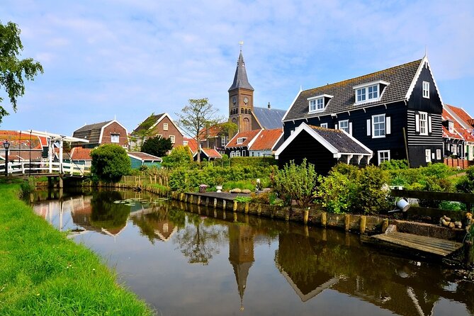 Private Excursion to Zaanse Schans, Edam, Volendam and Marken - Stop 3: Volendam harbor time, dykes explanations, and lunch choices