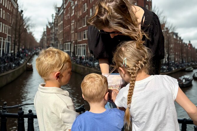 Private Kids Tour Amsterdam - Torensluis canal houses and hoisting beams, plus a secret prison idea