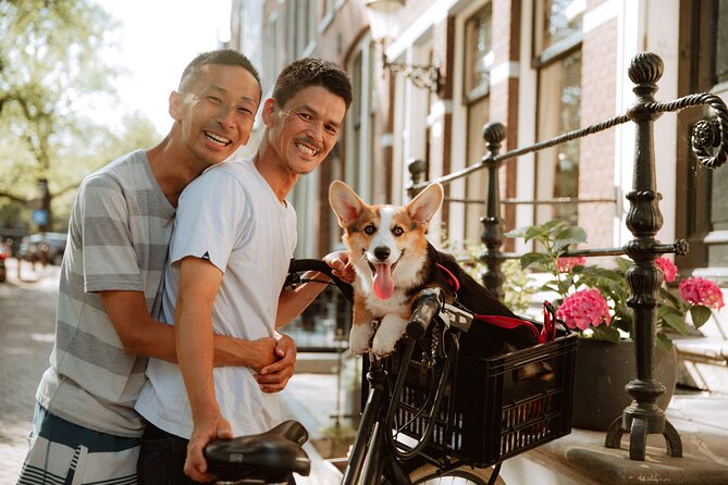 Private Love Story Photowalk Experience - Stop 2: Damrak for Canal-Side Energy and Easy Wayfinding