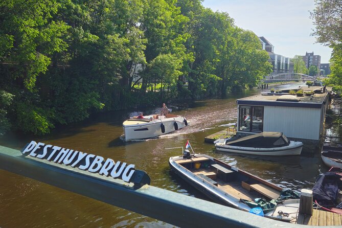 Private Minivan Sightseeing Tour in Amsterdam - Dam Square and the Red Light District: start with Amsterdam’s loudest landmarks