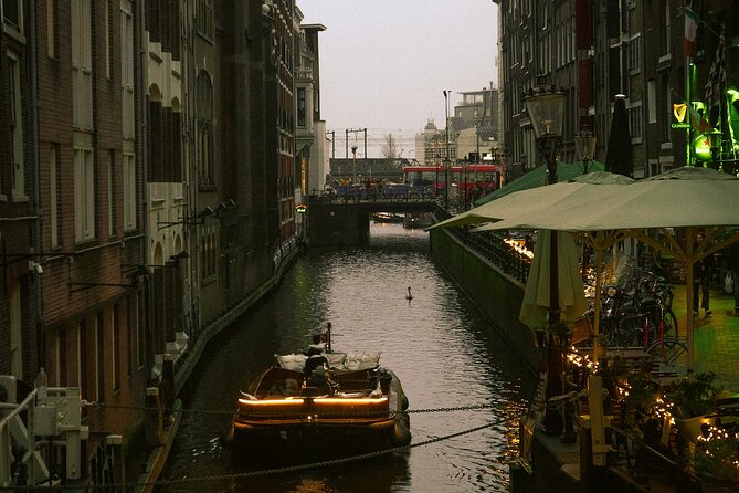 Red Light District Tour - It's History & It's Future - Weeping Tower to St. Nicholas Basilica: seeing Amsterdam’s story in two tones
