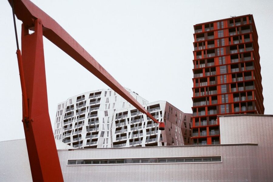 Rotterdam Architecture: Centre and South Bank with watertaxi - Watertaxi speedboat under the Erasmus Bridge for skyline views