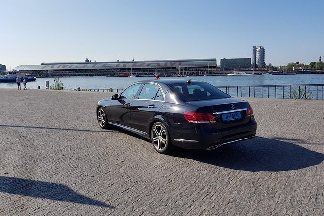 Schiphol Airport Private Transfer to Amsterdam with Meet & Greet - Prebooked meet and greet at Schiphol, including the temporary meeting point