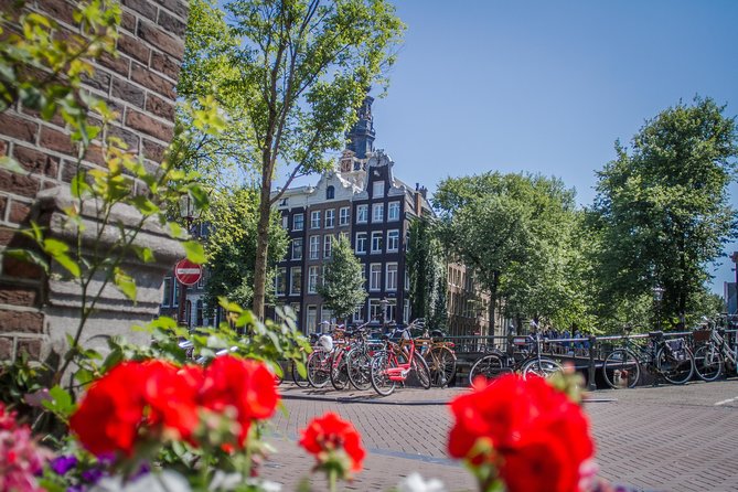 Secrets of Amsterdam Walking Tour plus Dutch Sweets Tasting - Royal Palace, Dam Square, and the New Church: your city orientation anchor