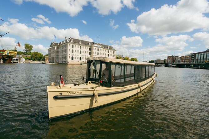 Small-Group Luxury Canal Cruise with Local Skipper - Stop 5: crooked canal houses near the Amstel