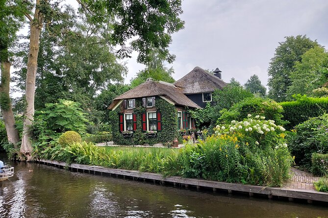 Small-Group Tour to Windmills & Giethoorn with boat tour - Zaanse Schans: windmill museums, wooden shoes, and cheese tasting
