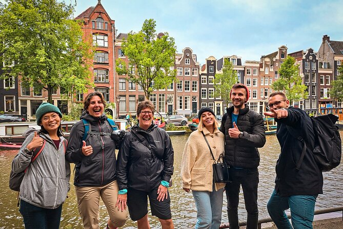 Small Group Walking Tour - Hello Amsterdam - Stop 6: Torensluis and the UNESCO Canal Belt, Including Slavery History