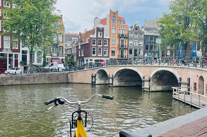 The Original Bike Tour of Amsterdam Highlights and Hidden Streets - What You Pay for at $42.05, Including Bike and Stroopwafel