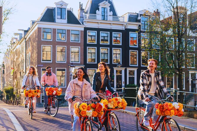 Top 10 Tastes of Amsterdam: Food & Culture Bike Tour - Riding the UNESCO Canal Belt: Your Moving Photo Session
