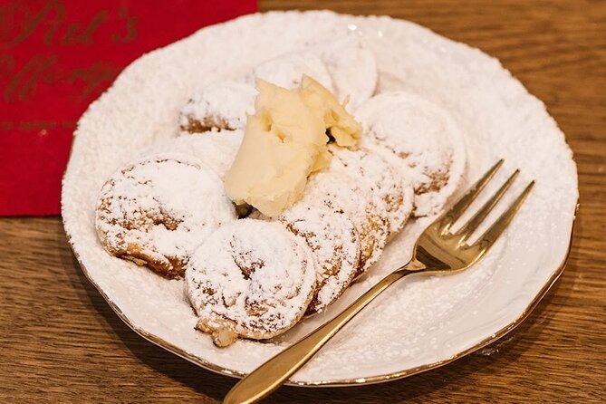Top 10 Tastes of Amsterdam: Food & Culture Bike Tour - Haarlemmerdijk: Herring and Battered Cod Bites