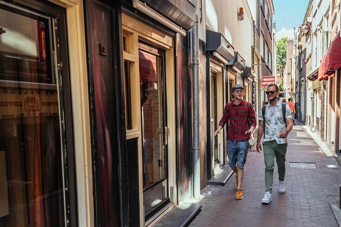 Treasures of Amsterdam: Coffeeshops & Red Light District Private Tour - Beyond the adult signs: Chinatown, narrow streets, and Nieumarkt